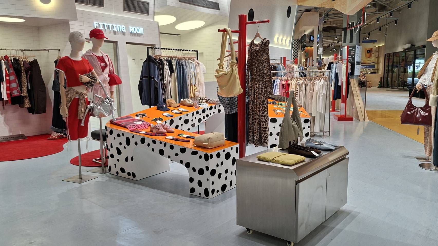 Display tables and mannequins inside the store