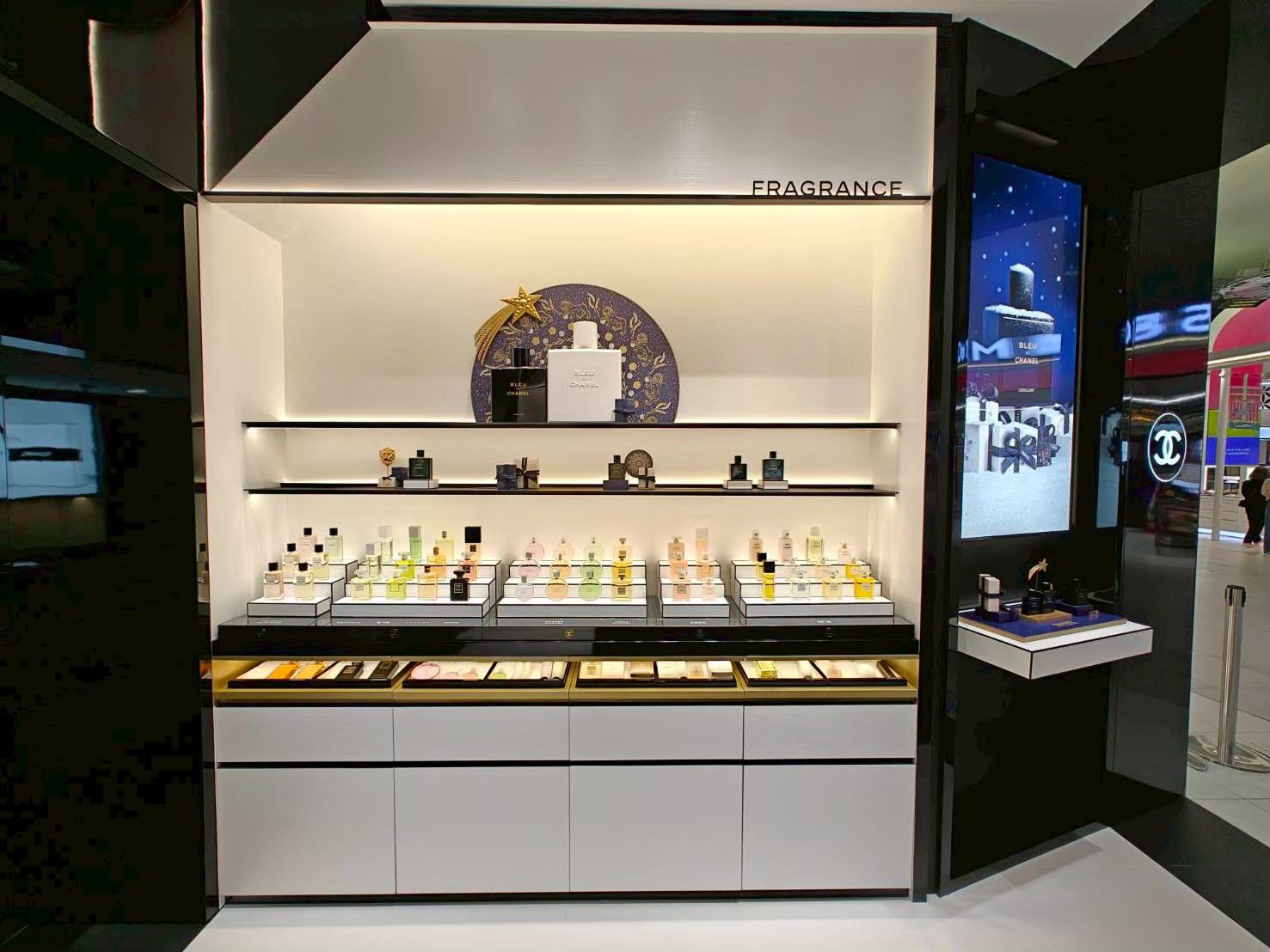 Backlit fragrance wall with lacquer frame