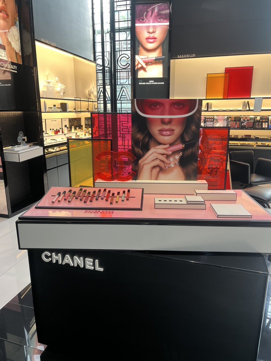 Counter display unit with gloss testers