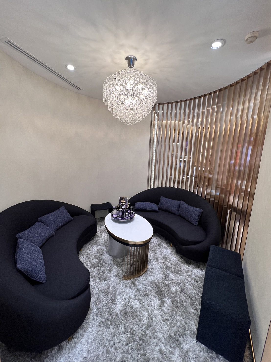 Client lounge with curved sofa