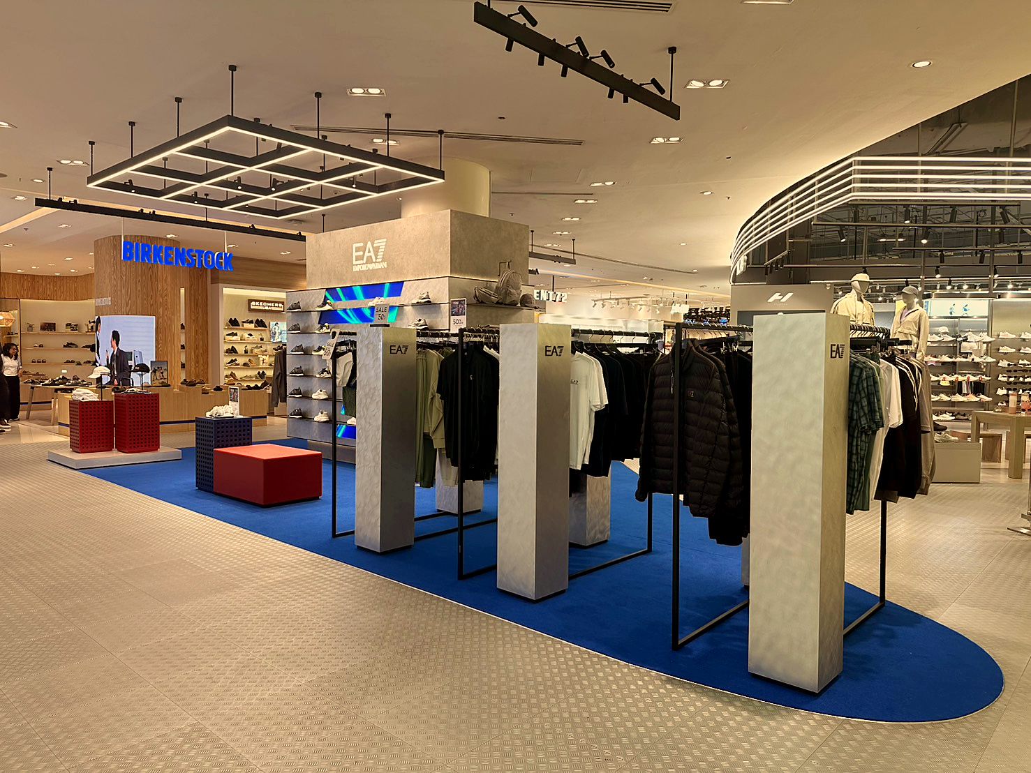 Clothing racks on the sports-track floor