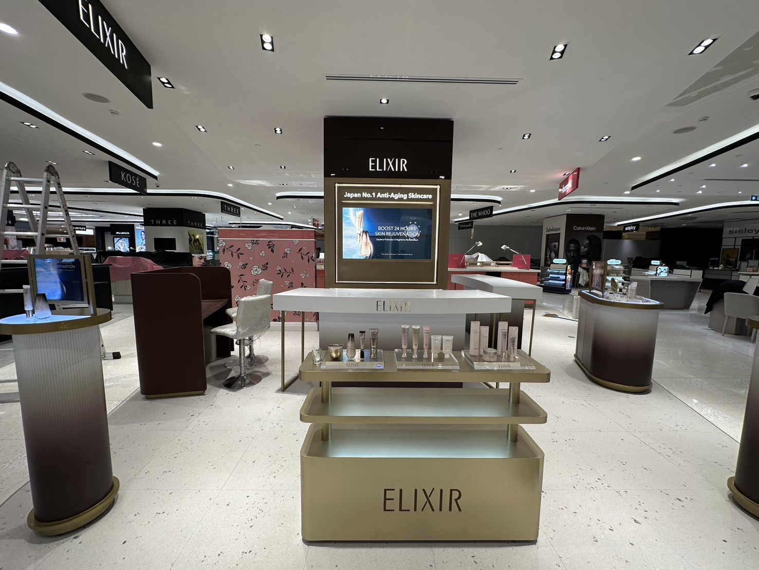 Gold display table with product trays