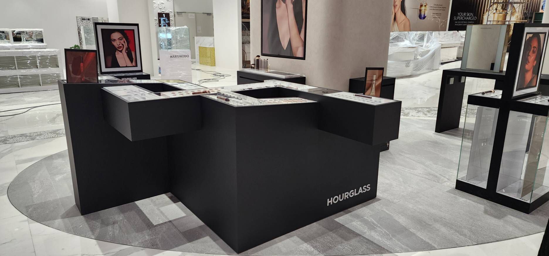 Hourglass display tables at Siam Takashimaya