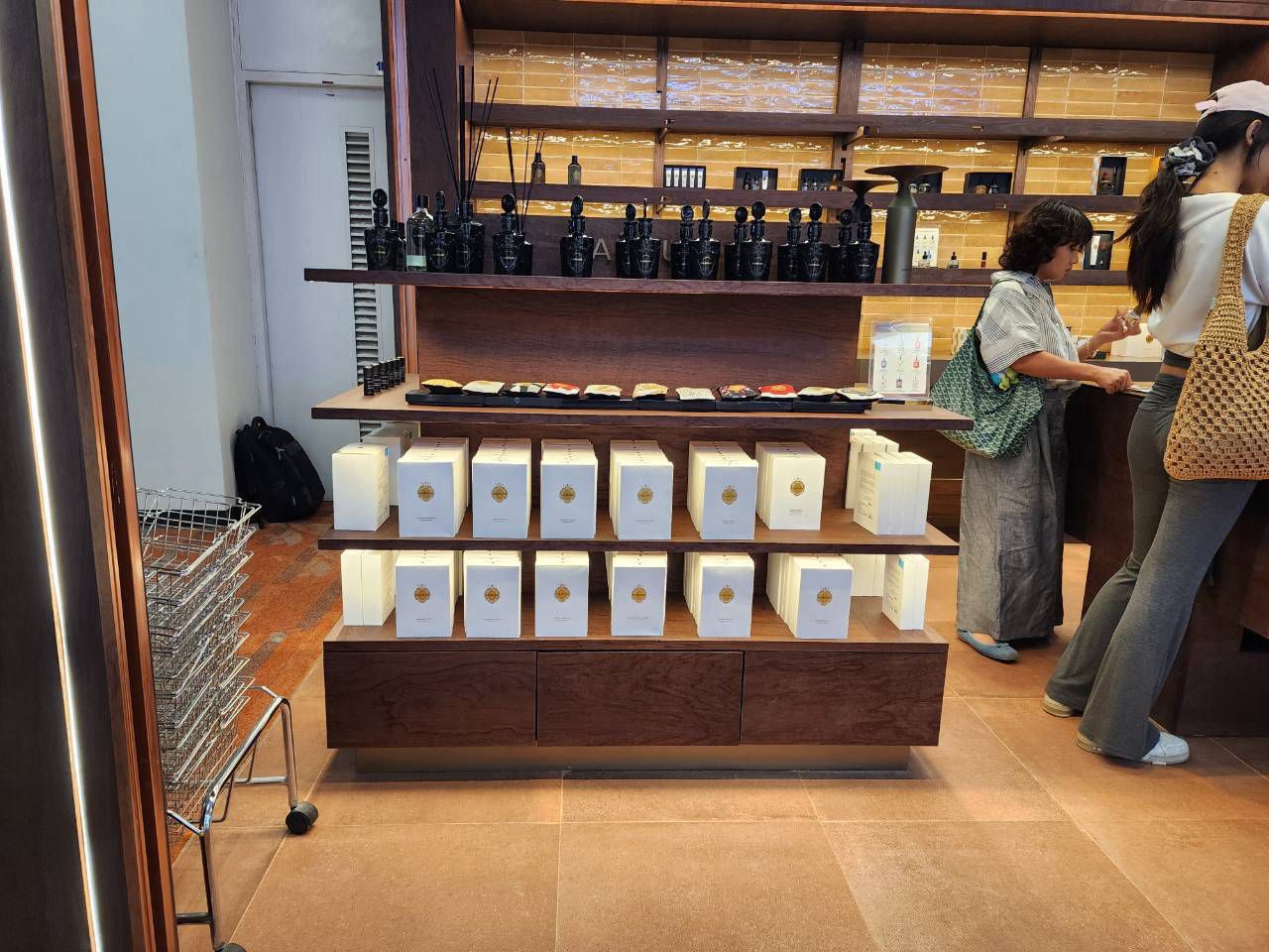 Merchandised displays with customers browsing