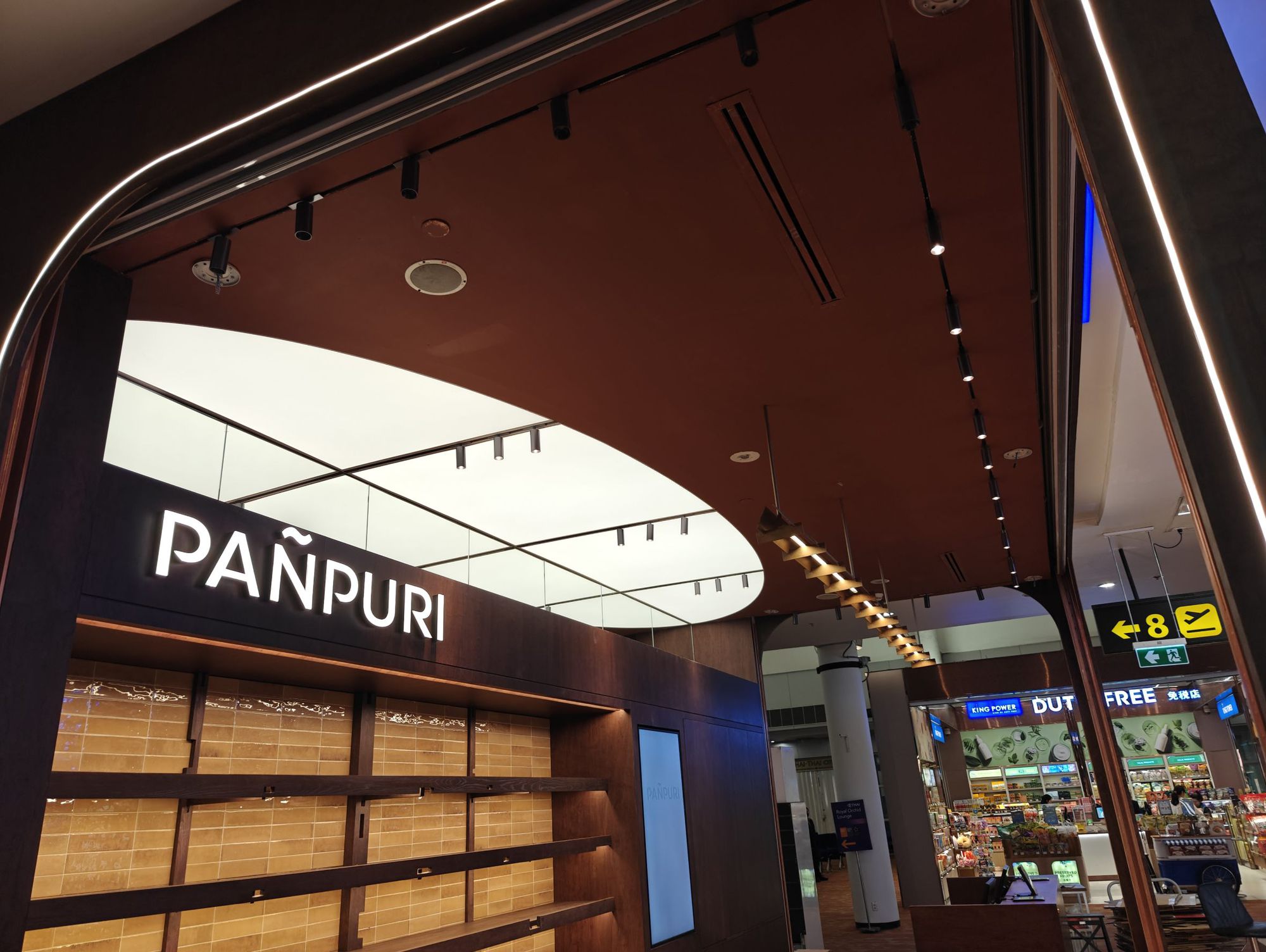 PAÑPURI signage on the curved fascia