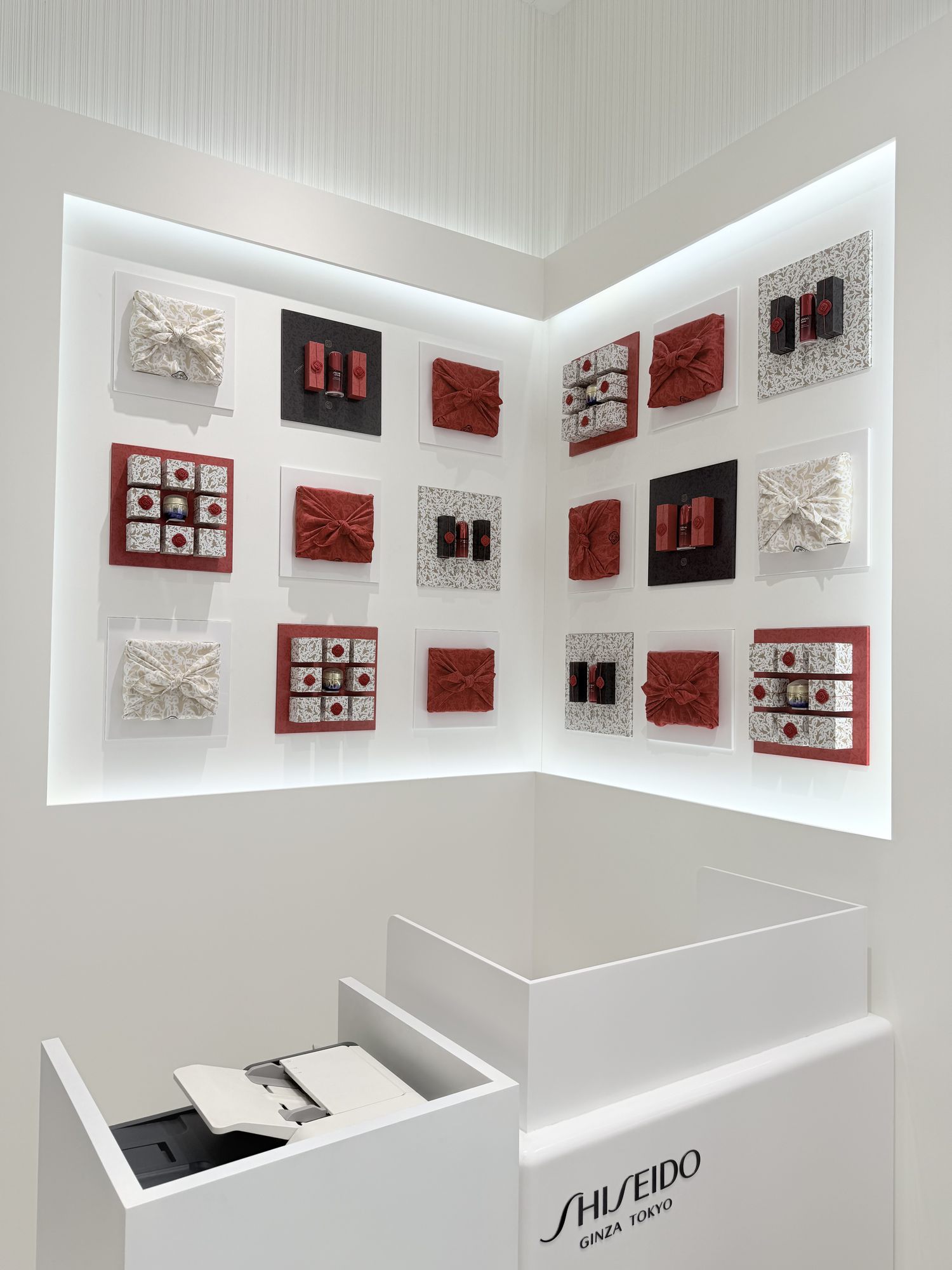 Red-and-white product display wall